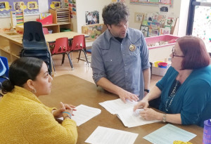 MEETING OF THE MINDS: Local 888 field rep Madeline Soto, teacher and shop steward Jonathan Dudley and teacher Paula Mulligan talk shop at the Leominster Head Start Center.