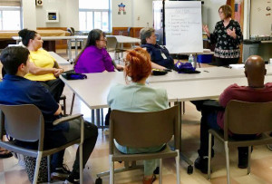 TALKING SHOP: Local 888 President Brenda Rodrigues speaks with members during her recent visit to the Chelsea Soldiers Home. 