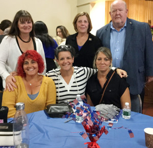 GANG’S ALL HERE: Brockton cafeteria workers, front row from left, Lisa Mather, Karen Warren, Jean Roy and, standing, Tina Rabs are seen with Local 888 President Brenda Rodrigues and political organizer Michael Kelly at a Brockton event.