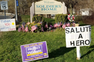 ‘PROTECT VETERANS’: This sign at the entrance to the Holyoke Soldiers’ Home is part of Local 888’s renewed campaign to provide high-quality care.