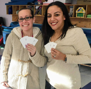 HEALTHY AGREEMENT: Michelle DaSilva, left, CAAS Head Start employee and union leader, and internal organizer Madeline Soto celebrate the ratification of a new contract.