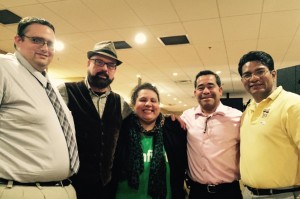 Enio Lopez (second from right) celebrating his victory with supporters.  