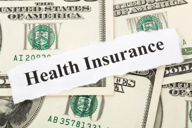 Health Insurance on money image
