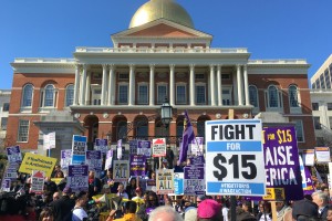 More than a thousand people demonstrated in favor of a $15 minimum wage at the statehouse on April 14. The rally was part of a day of action in dozens of cities around the world. See additional picture and more info on page 2. 