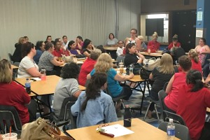 Brockton Cafeteria workers held a large membership meeting last year before contract negotiations to affirm their support for winning a new contract and to hear from State Rep. Michelle DuBois (standing in photo above) who strongly supported the workers.