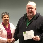 Former Executive Board member Mike Kelly receives his Labor Guild diploma