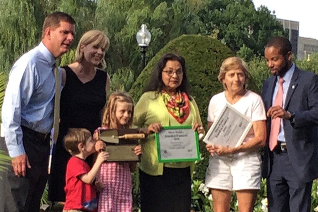 Nasim is an avid gardener and has been recognized for her accomplishments several times by the City of Boston. Above, Mayor Martin Walsh presented Nasim with a "Beautification of Boston" award for her garden last August.