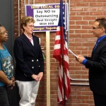 Anita Christon and Janet King take their oath of office and are sworn in as new officers by President Mark DelloRusso.