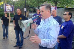 Councillor Neil Kinnon spoke at the rally.  "You're not to blame for the schools not being properly cleaned," said Kinnon.  "The current budget isn't in line with the cost to get the job done right."  