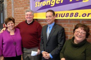 Tom MacDonald, Director of Social Ministries at St. Mary-St. Catherine Parish who runs the Harvest on the Vine Food Pantry and Donna O'Brien, a retired teacher and former Boston Teachers Union member with Mark and Brenda. 