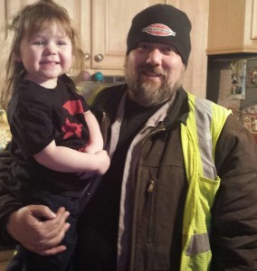 Local 888 member Josh Clancy, who plows roads for the town of Tyngsborough, with three-year-old Lydia.