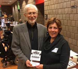 Brenda Rodrigues (shown above with author Les Leopold) attended a national Single Payer strategy conference in NYC on Jan. 14. SEIU members voted to support Medicare for All at the 2016 International Convention in Detroit.