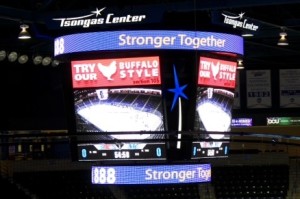 Score board show's Local 888's message: "Stronger Together" 
