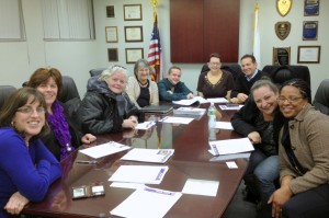 Officers Mark DelloRusso and Brenda Rodrigues attend a meeting with Local 888 members at the Brockton Housing Authority.