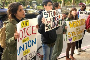 Students at Emerson College hold a rally to show their support for staff who are seeking to form a new union.